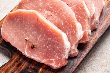 raw pork fresh cuts of meat steak slices fresh delicious snack healthy meal food snack diet on the table copy space food background rustic top view