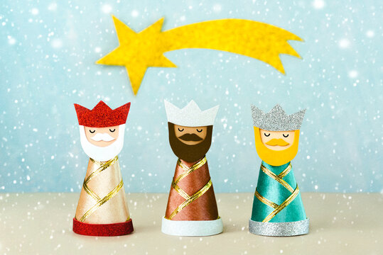 The three wise men with golden star and snowflakes. Concept for Reyes Magos day,Three Wise Men