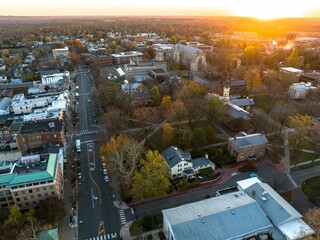 Drone view of golden sunrise over Princeton New Jersey. Cityscape with famous landmarks