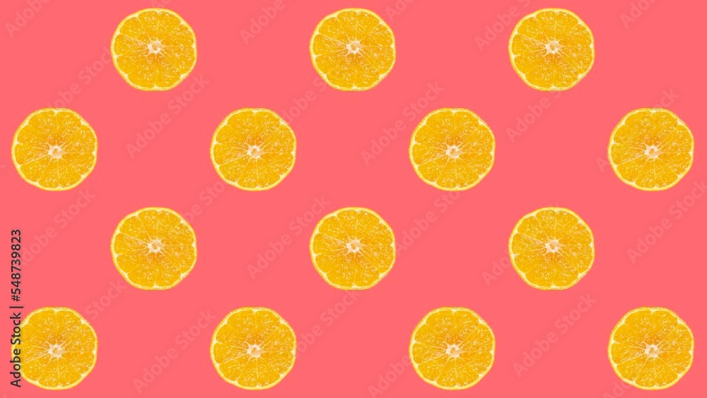 Aufkleber mandarin slices in animated grid seamless loop pattern on a coral background. abstract background wi