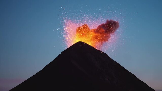 Close up at blue hour stable tripod shot of exploding volcano, Fuego Guatemala at blue hour after sunset, 4K.