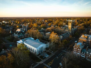 Drone view of golden sunrise over Princeton New Jersey. Cityscape with famous landmarks