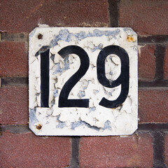 house number one hundred and twenty nine (129)