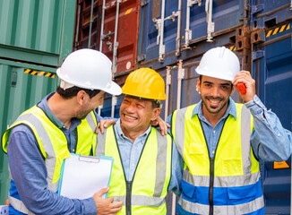 Happy multiethnic professional engineers teamwork smiling and laughing together. Worker team's achievements and happiness at work