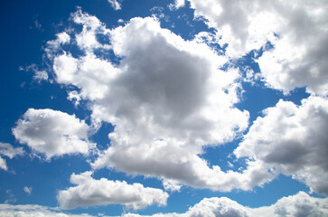 Naklejka premium White clouds on the blue sky