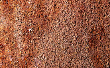 Old rusty metal sheet as an abstract background.