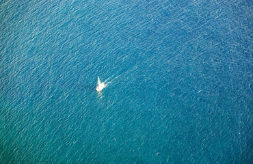 sailing vessel in the deep blue ocean