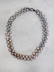 90’s choker necklace or tattoo necklace on mottled gray