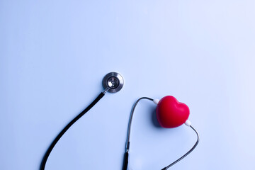 Stethoscope to listen to red heart rate to diagnosis disease. Healthcare concept.