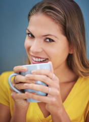 Happy woman, studio and coffee or tea for morning motivation, happiness and inspiration with hot drink for energy, relax and break. Portrait of female in studio while drinking beverage from cup