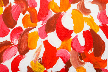 Beautiful strokes of bright oil paints on white canvas as background, closeup