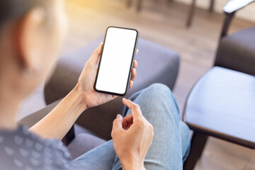 cell phone blank white screen mockup.hand holding texting using mobile on desk at office.background empty space for advertise.work people contact marketing business,technology