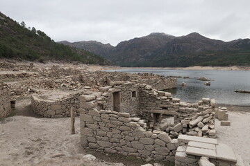 The ruins of Vilarinho da Furna during the dry season, when the former-village becomes exposed Peneda-Geres Portugal