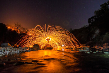 Steel wool long exposure photography in night.