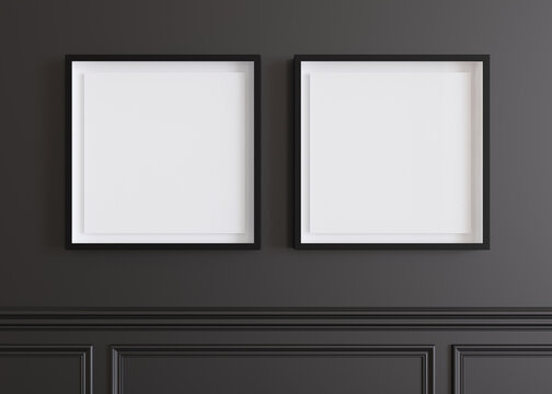 Two blank square picture frames hanging on black wall. Template, mock up for artwork, picture or poster. Empty, copy space. Close up view. Simple, minimalist mockup. 3D rendering.