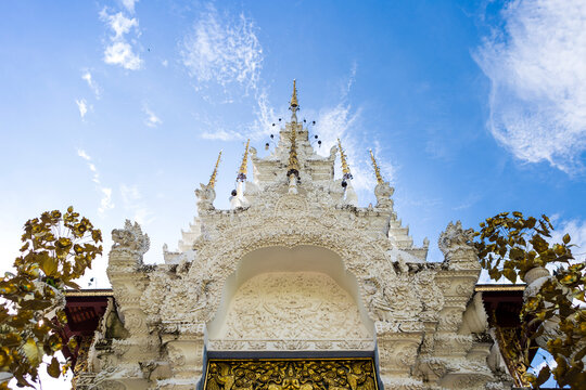 Beautiful traditinal Thai design arch at the temple entrance in North of Thailand, historical and religious architecture