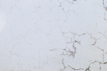 Empty white cement wall with crack texture background, old concrete wall background