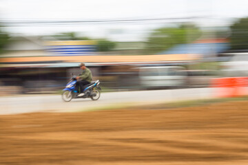 Motorcycling Panning on road In Thailand