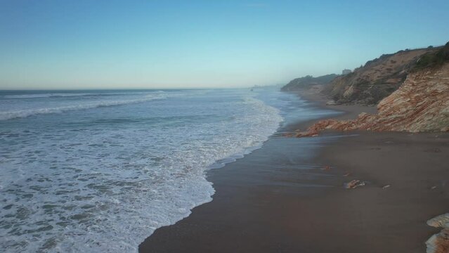 Atlantic Ocean with fog on the horizon before sunset