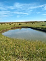 landscape with river and blue sky