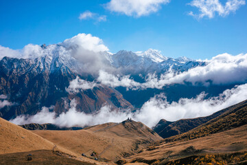 Stunning open landscape with no people in the mountains of Greater Caucasus in Georgia. Snowy...