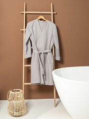 Grey waffle bathrobe in bathroom