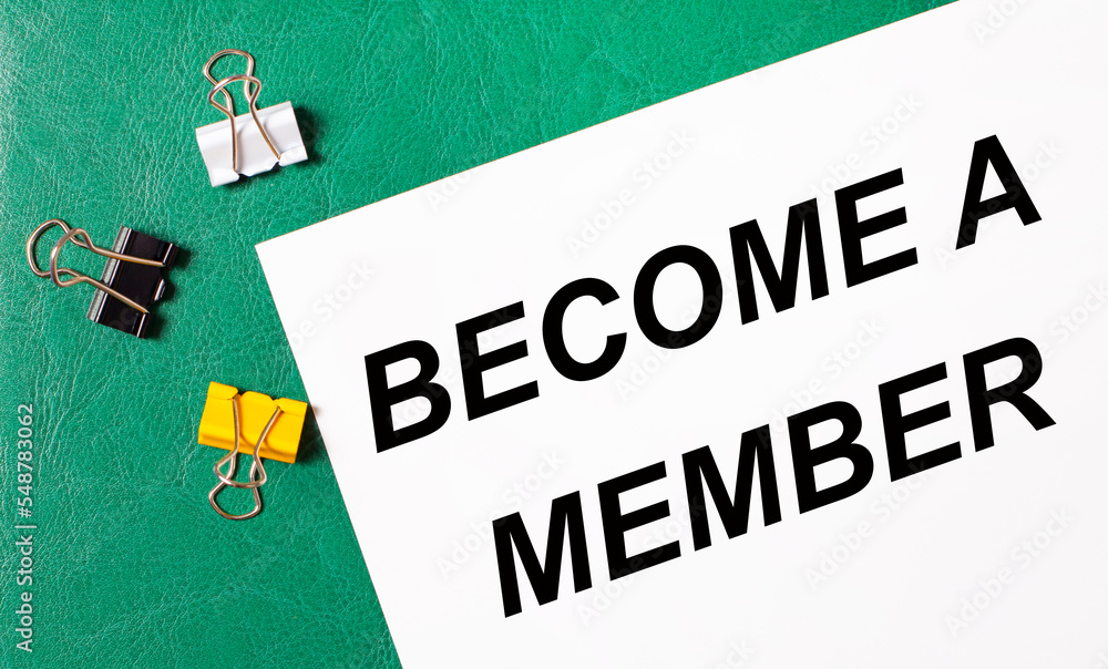 Aufkleber multi-colored paper clips and a sheet of paper with the text become a member on a green notepad.