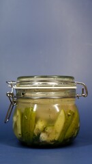 Cucumber pickles in a ferment jar