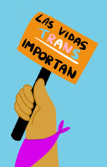 Mano con cartel sobre los derechos de las personas trans