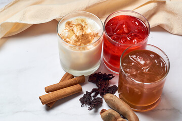 Jamaica, horchata and tamarind water cups, traditional from mexico. - obrazy, fototapety, plakaty