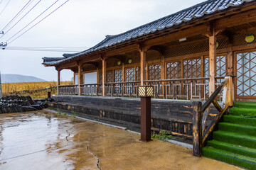 Fototapeta na wymiar Rainy landscape of Chinese Korean centennial tribe