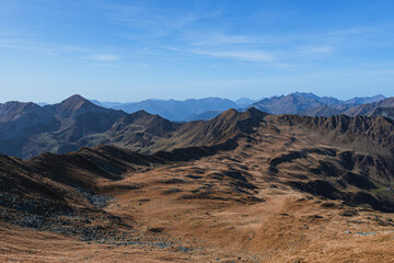 the nature and alpine landscapes of the Val Tartano and the Orobie Valtellinesi park, during an autumn day, near the village of Tartano, Italy - November 2022.