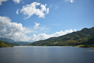 Bridge over the Mekong River in Lao PDR, the scenery on both sides of the Mekong River in Lao PDR, native boats use water travel.