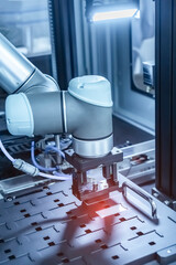 automatic gripping and smart robot working on smart factory,industry 4.0 and technology.