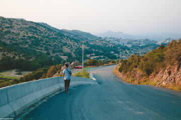 Man walking down hill