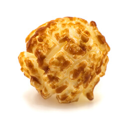 Caramel popcorn on a white background close-up. Popcorn Granule Isolate