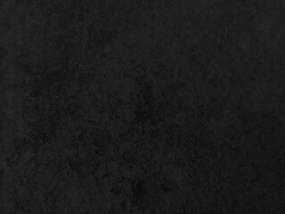 Abstract dark black grunge texture, Close up retro plain dark black ancient and dusty cement concrete wall texture, black background illustration for construction and design.	