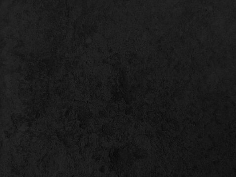 Abstract dark black grunge texture, Close up retro plain dark black ancient and dusty cement concrete wall texture, black background illustration for construction and design. © DAIYAN MD TALHA