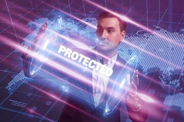 Business, Technology, Internet and network concept. Young businessman working on a virtual screen of the future and sees the inscription: Protected