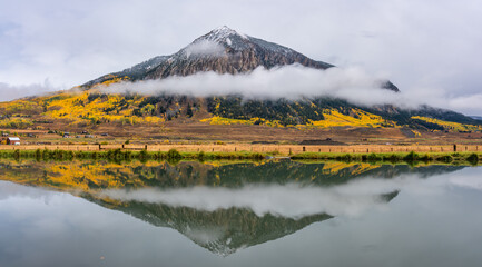 Crested Butte Mountain autumn aspen trees reflection from Rainbow Park in the town of Crested Butte