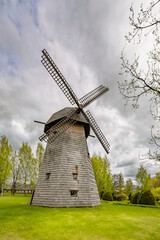 Old wooden windmill in rural area