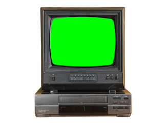 Old black vintage green screen TV and VCR from 1980s, 1990s, 2000s isolated on white background.