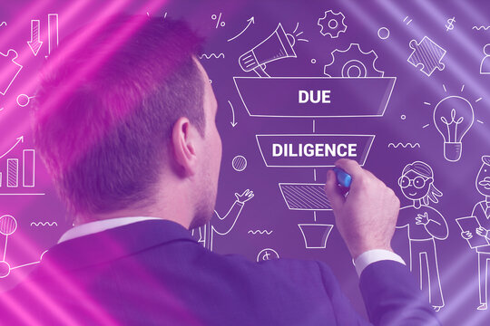 Business, Technology, Internet and network concept. Young businessman working on a virtual screen of the future and sees the inscription: Due diligence