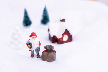 Santa Claus decoration in cozy  winterlandscape 