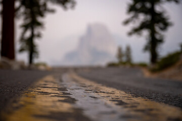 Chipped Road Stripe With Glacier Point In the Distance