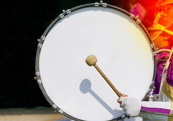 The Base drum that the orchestral students beat while walking in the parade. Soft and selective focus.  - obrazy, fototapety, plakaty