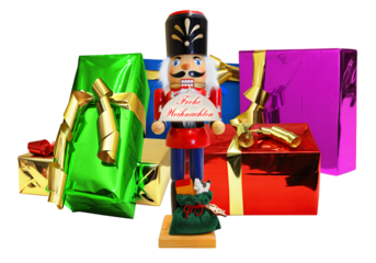 Beautiful colorful gift packages, wrapped in glossy paper and gold bow and a nutcracker to go with it.