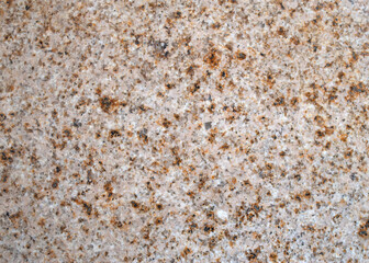Polished pink marble with brown spots close