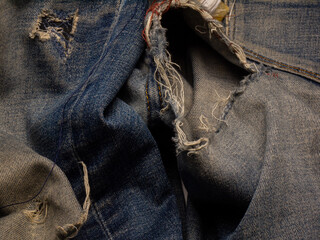 old ripped jeans, textiles and fabrics