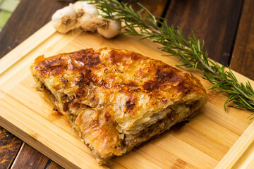 Savoury slice of pie with meat
